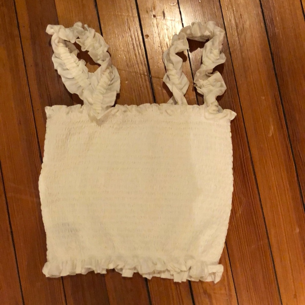 Cropped ribbed shirt with ruffled sleeves